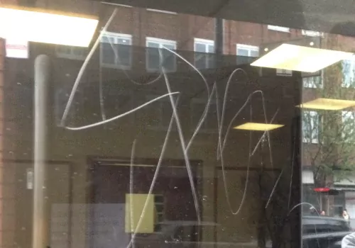 Etched Graffiti Damage Removal being undertaken across London