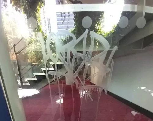 Graffiti Damage on Glass Door